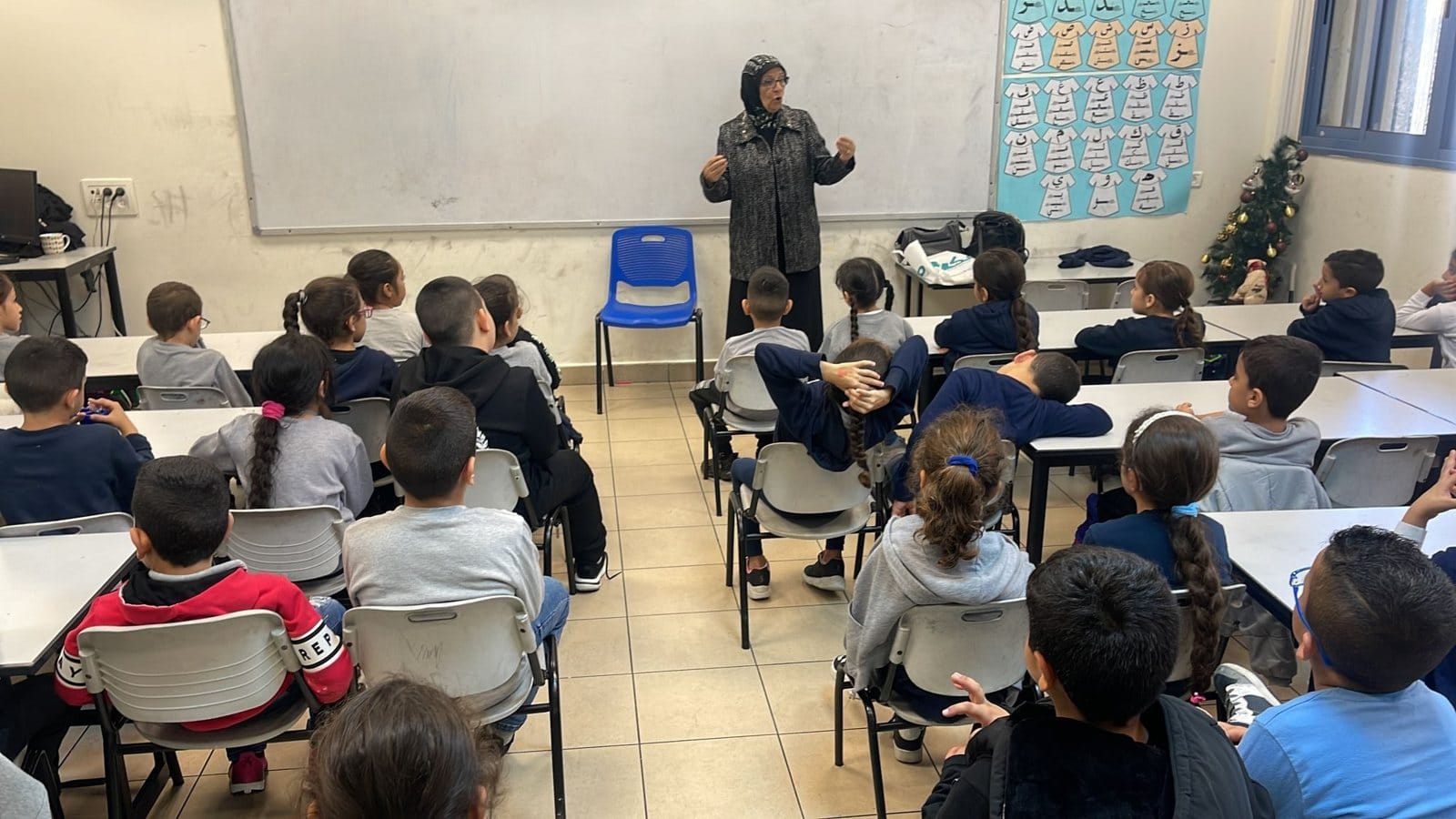 Schools Celebrate the International Arabic Language Day, the SDC Conducts Related Activities at 13 Schools · photo 5