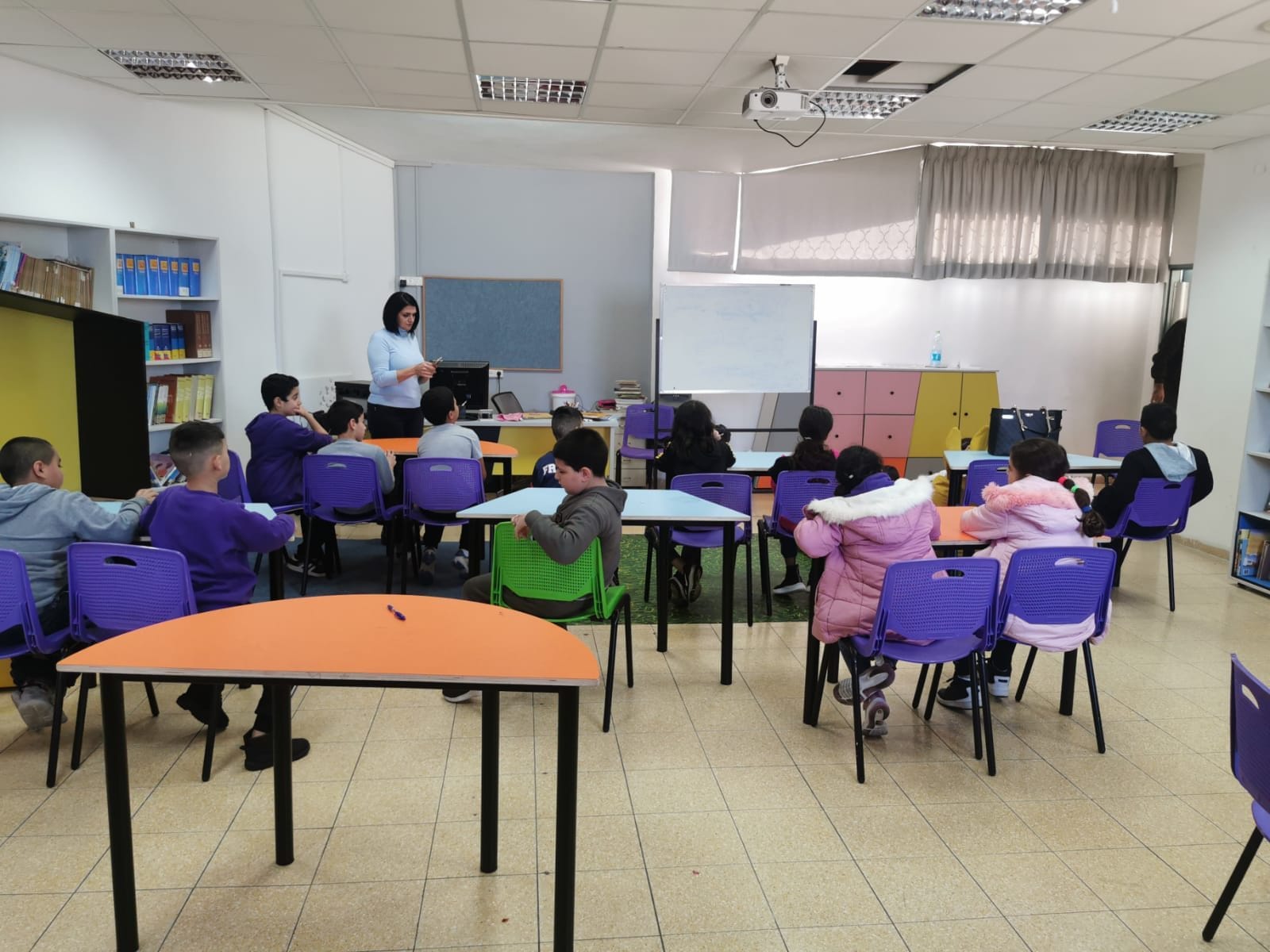 Schools Celebrate the International Arabic Language Day, the SDC Conducts Related Activities at 13 Schools · photo 6